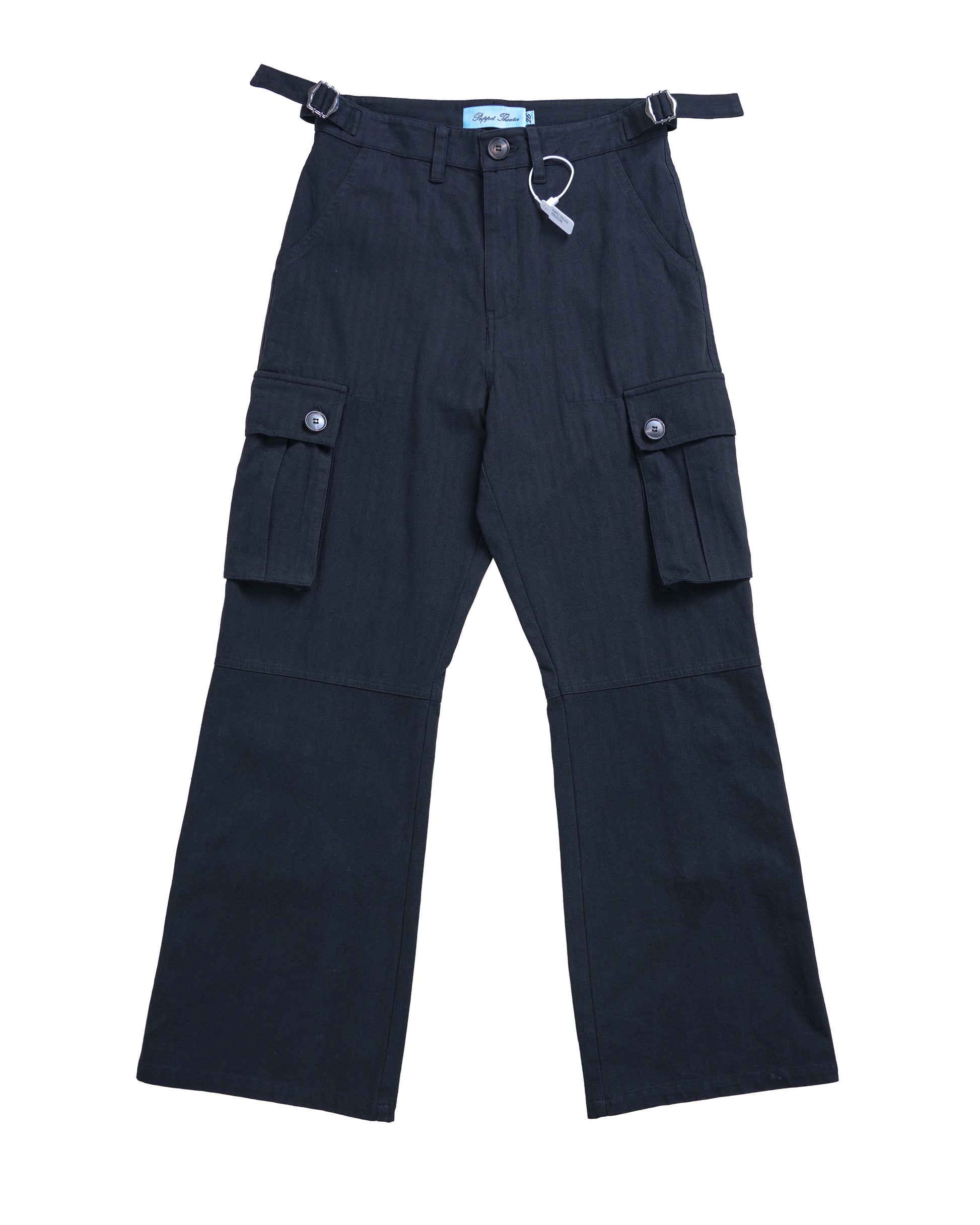 Six Pocket Flare Cargo flat lay front view showcasing heavy-duty 100% cotton twill herringbone fabric, detailed cargo pockets, and premium tailoring from Puppet Theater’s luxury streetwear collection.