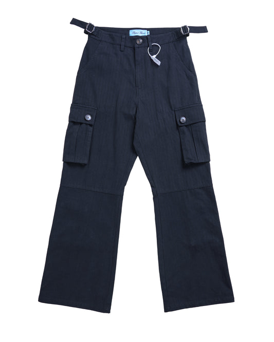 Six Pocket Flare Cargo flat lay front view showcasing heavy-duty 100% cotton twill herringbone fabric, detailed cargo pockets, and premium tailoring from Puppet Theater’s luxury streetwear collection.