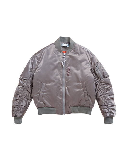 Flat lay front of the Ruched Bomber Jacket — olive green MA-1 inspired bomber with ruched sleeves, heavy rib trims, and luxe satin lining.