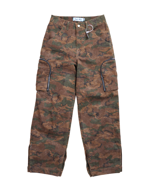 Flat lay front of Puppet Theater Objector Cargo Pants — luxury streetwear cargo pant in custom woodland camo twill with sculptural fit and curved silver zippers