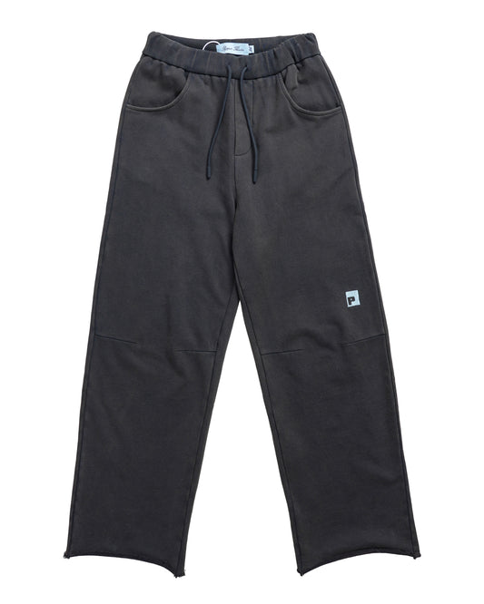 Flat lay front of Puppet Theater 86 Sweatpants — distressed brown vintage-wash terry sweatpant with oversized flowy cut and articulated knee
