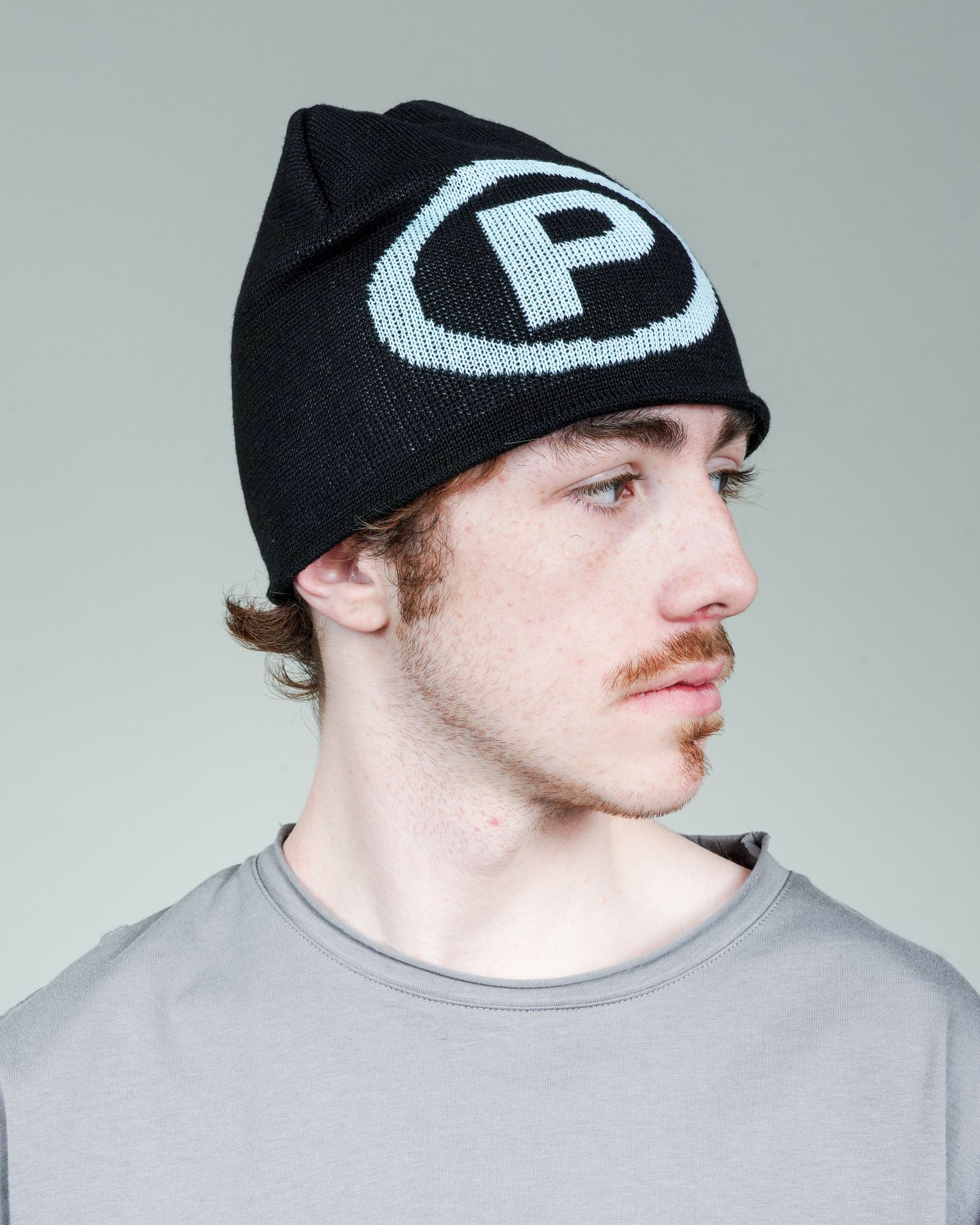 Puppet Corp Beanie in Black and Eggshell Blue
