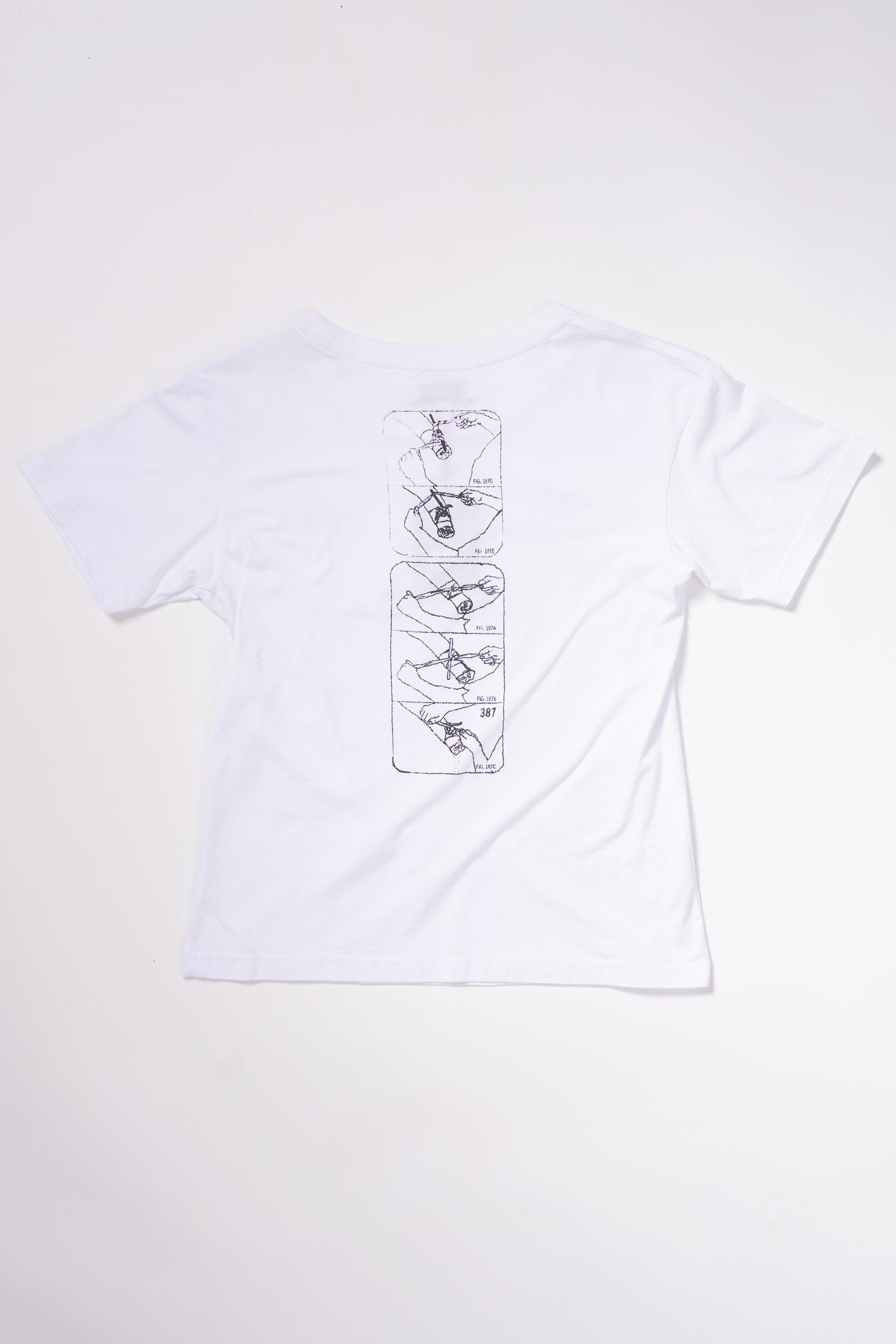 Tourniquet Tee in Piano White - Puppet Theater